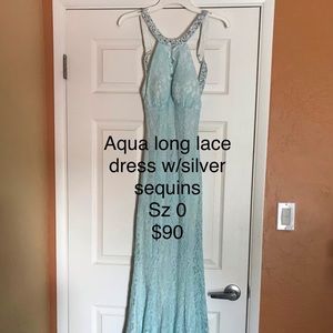 Junior long form fitting aqua lace dress